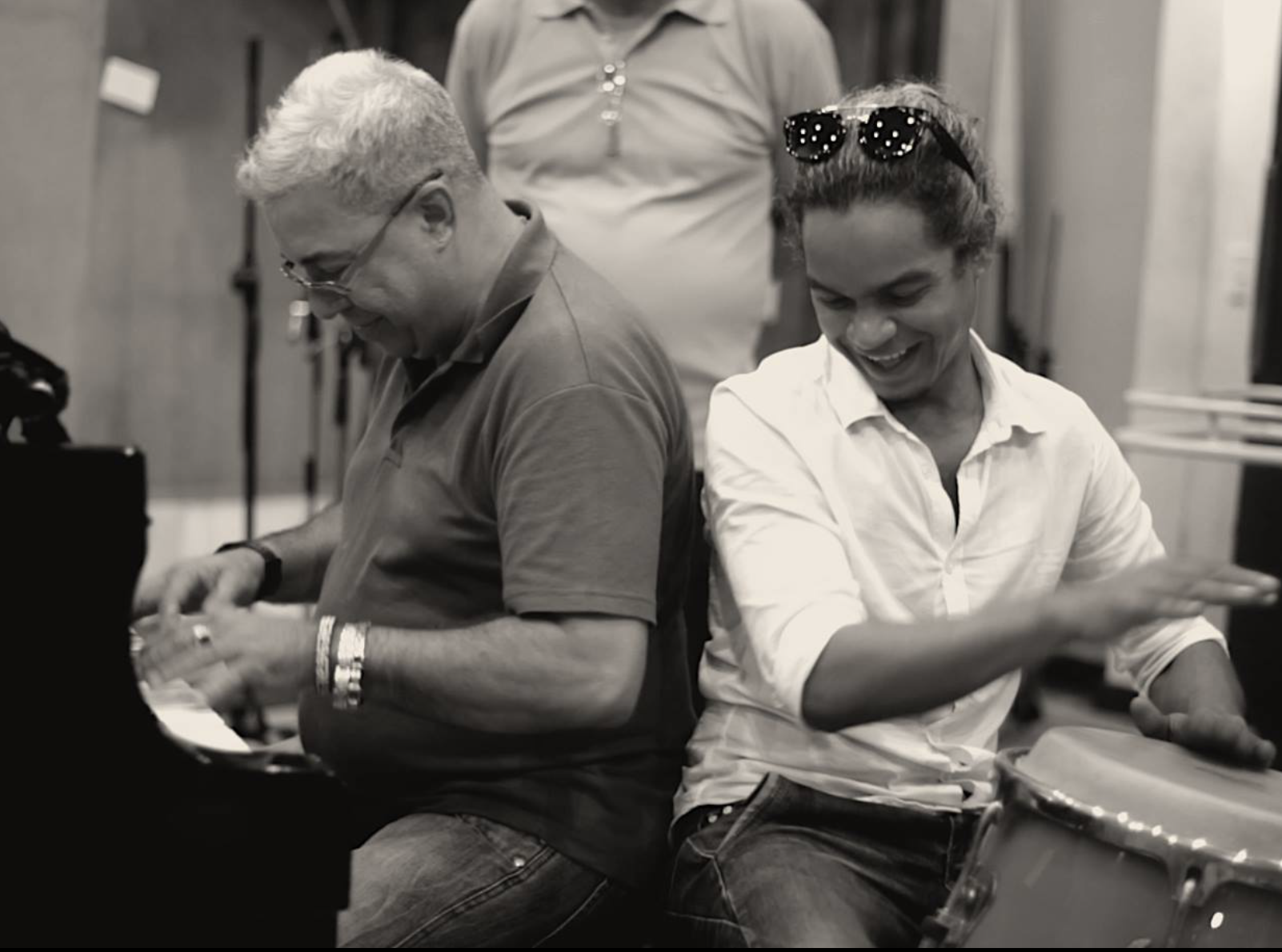 Cuban percussionist on stage during a live session